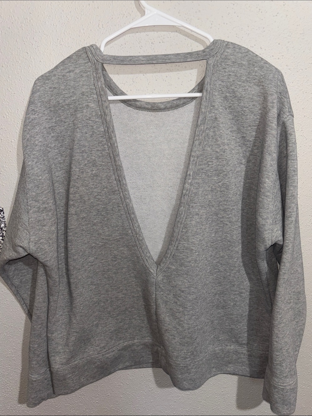 Nike - Women’s open back light  Gray sweatshirt (Size Large)